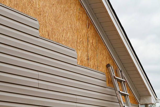 Professional Siding Installation technician working in Wynnewood, PA